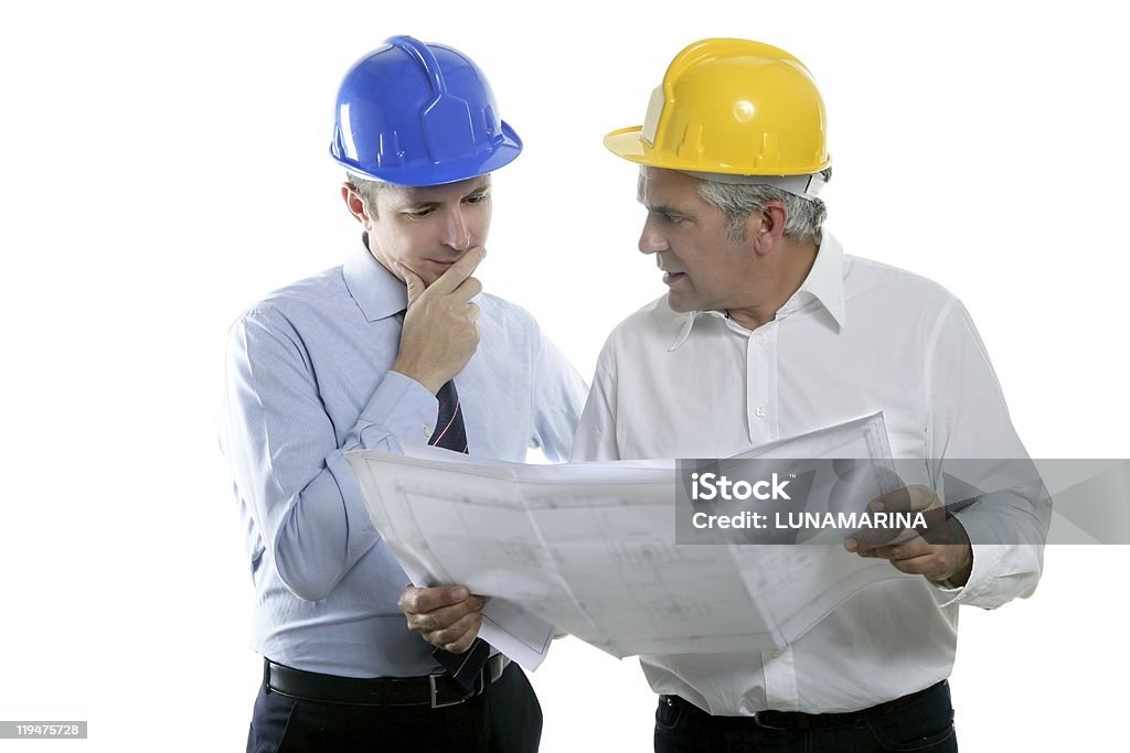 Ingénieur architecte expertise deux équipe plan Casque de chantier - Photo de Adulte libre de droits