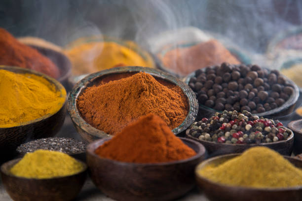 istock Smoke, Aromatic spices on wooden background 1194759997