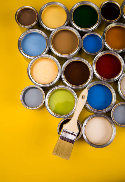 istock Creativity concept group of tin metal cans with color paint 1194761330