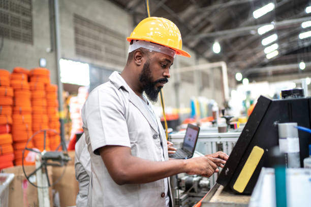 istock Man working in the factory 1194767229
