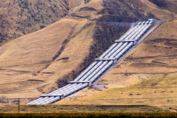 Photo of Aqueducts at the south end of San Joaquin Valley, taking pumped water uphill, over the Grapevine, en route to Los Angeles, part of the California State Water Project, California, USA