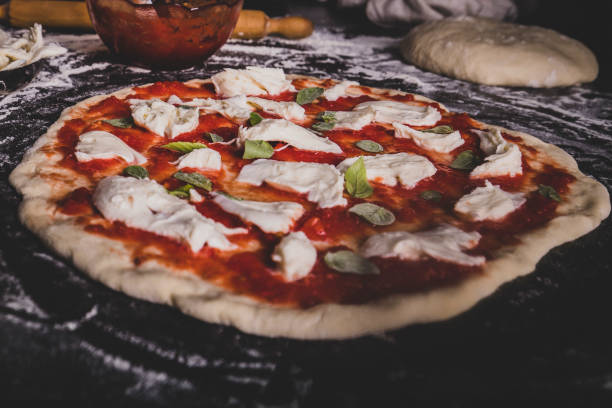 istock Making an Italian pizza at home 1194773980
