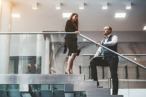 istock A business talk at office stairs 1194776887
