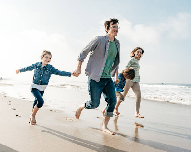 istock FAmily on the beach 1194788014