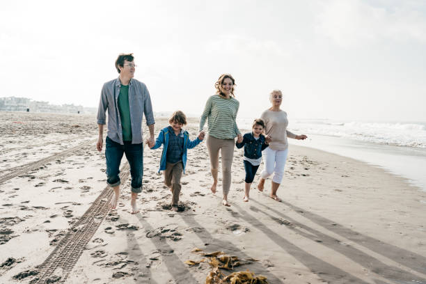 istock Three generation family on the beach 1194788018
