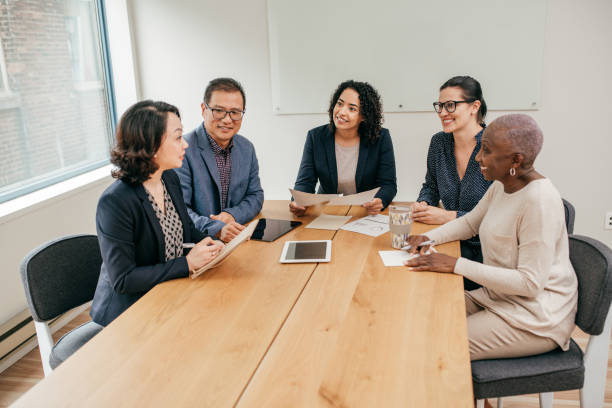 istock Business meeting in a boardroom 1194788036