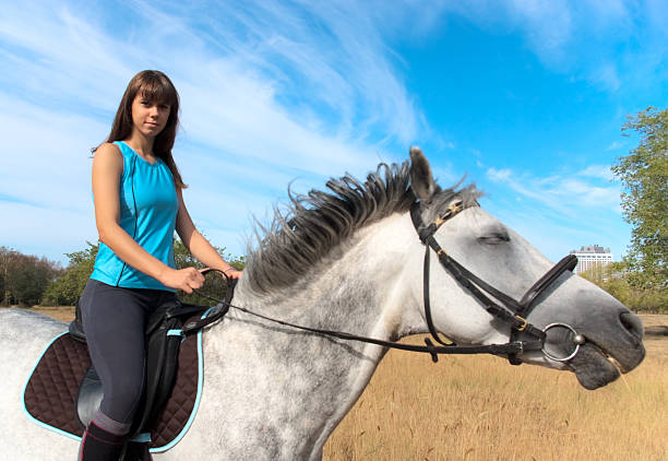 istock Girl on a horse 119479961