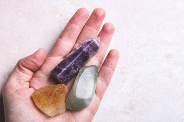 istock Mineral stones in a female hand 1194809639