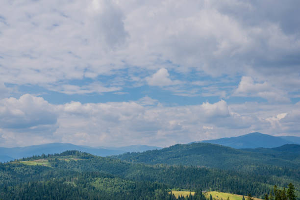 istock Summer landscape in mountains and the dark blue sky with clouds. 1194810048