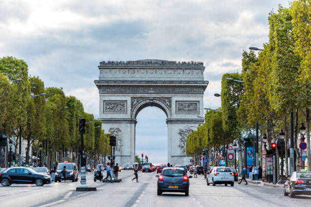 Arc de Triomphe at the Champs-Elysees Avenue in Paris, France stock photo