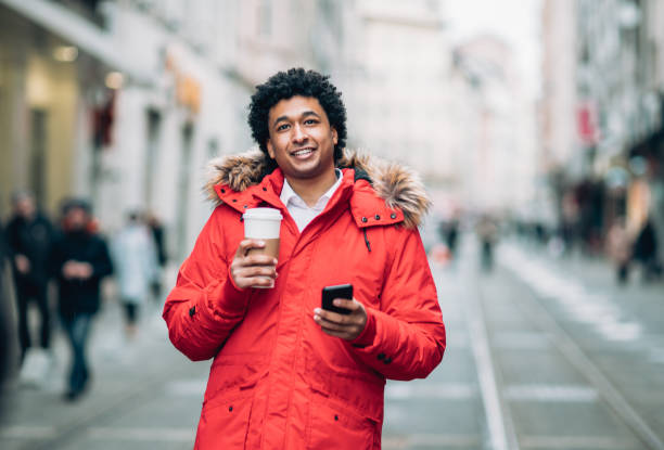 istock Modern man walking on the street 1194817178