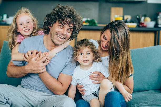 istock Family playing on the sofa 1194817422