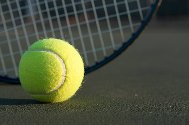 istock Tennis Ball and Racket 119481865