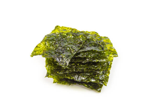 istock Nori seaweed isolated on white. 1194819972