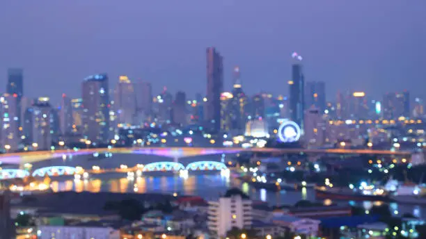 Photo of Blurred of bokeh city aerial view from the rooftop view point image in the night