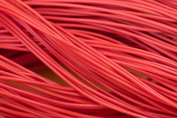 istock Bundle of red cabling of telecommunication network 1194826888
