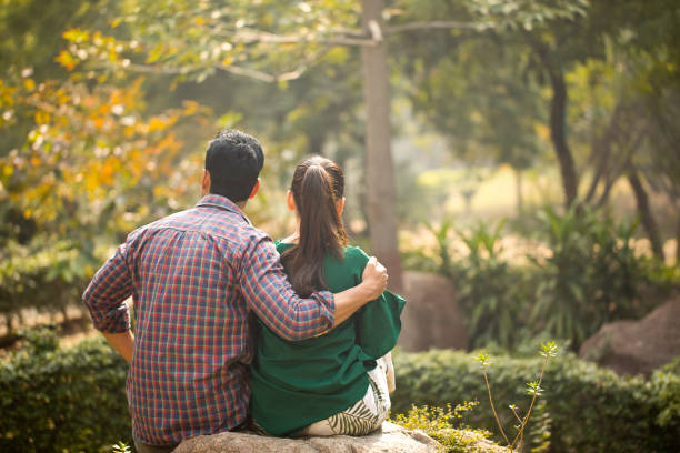 istock Couple admiring view at park 1194827561
