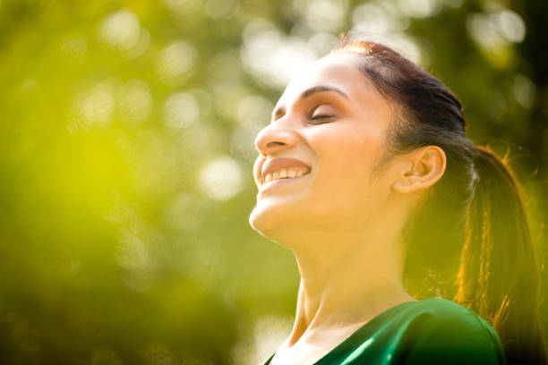 istock Laughing beautiful woman outdoor 1194827992