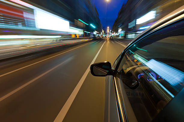istock Car driving fast in the night city 119482961