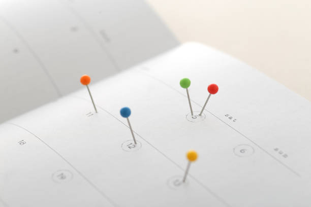 istock Calendar with colorful pins 1194829982