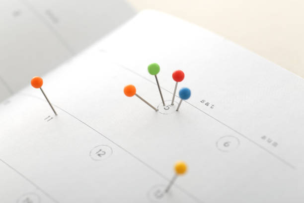istock Calendar with colorful pins 1194830050