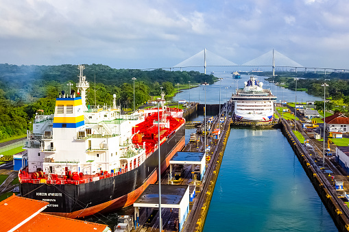 Panama Canal, Panama - December 7, 2019: A cargo ship entering the Miraflores Locks in the Panama Canal, in Panama