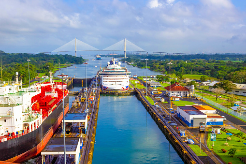 Panama Canal, Panama - December 7, 2019: A cargo ship entering the Miraflores Locks in the Panama Canal, in Panama