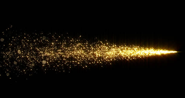 Golden glitter light tail, sparkling shining comet trace with glare effect. Gold glittering magic shimmer, glowing golden light sparks and particles flare on black background Golden glitter light tail, sparkling shining comet trace with glare effect. Gold glittering magic shimmer, glowing golden light sparks and particles flare on black background comet photos stock pictures, royalty-free photos & images
