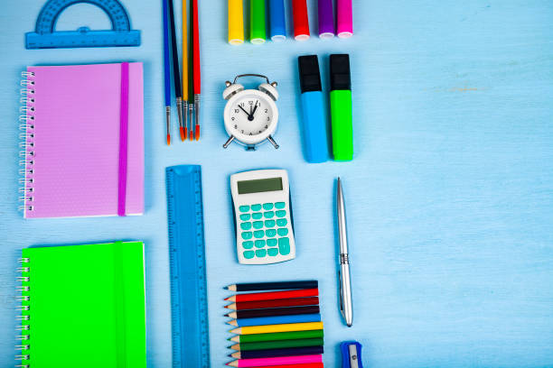 istock Items for the school on a wooden table. 1194831293
