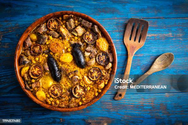 Arroz Al Horno Oven Rice In Clay Pot Spain Recipe Stock Photo - Download Image Now - Paella, Blue, Rice - Food Staple