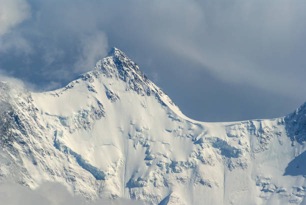 istock closeup mountain peak in a snow 1194833907