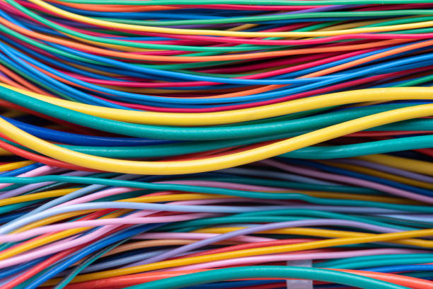 Multicolored electrical computer cable installation Multicolored electrical computer cable installation wire stock pictures, royalty-free photos & images