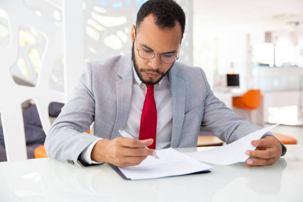 istock Professional businessman signing contract 1194833966