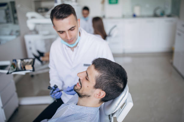 istock Young man at the dentist ordination 1194835334