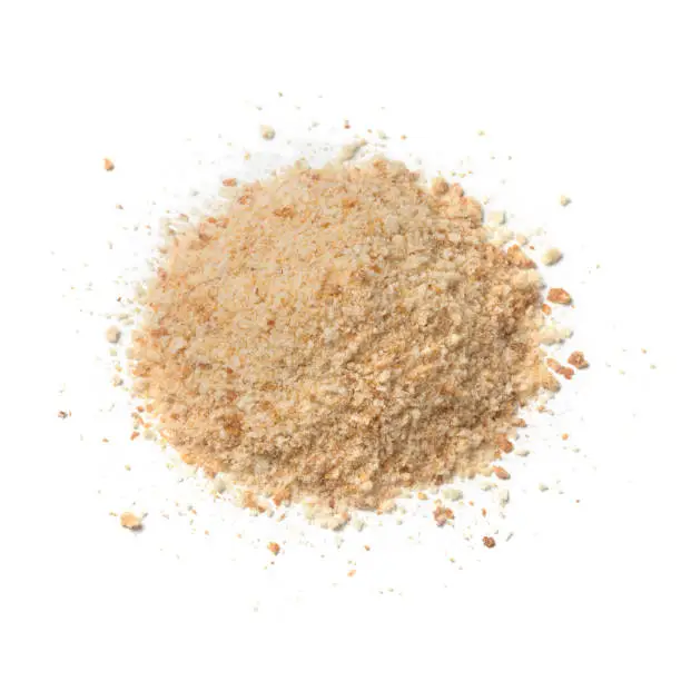 Heap of  bread crumbs isolated on white background