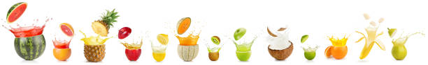 splashing fruit in a row on white background