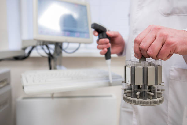 istock Close up scientist doing chemical test in modern laboratory. Selective focus 1194843013