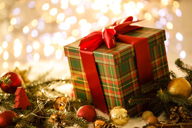istock Christmas home decor and a gift box with a red bow 1194843342