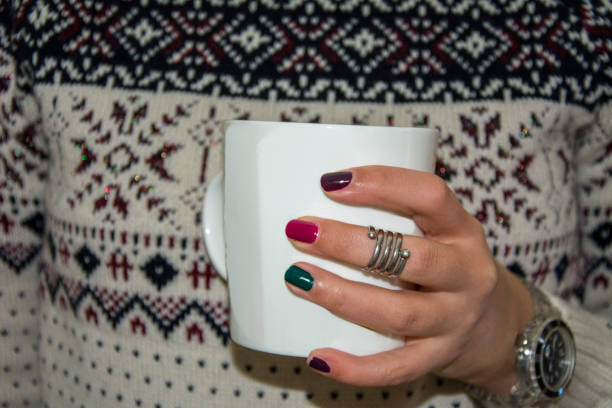 istock Woman holding coffee mug, Christmas atmosphere 1194845136