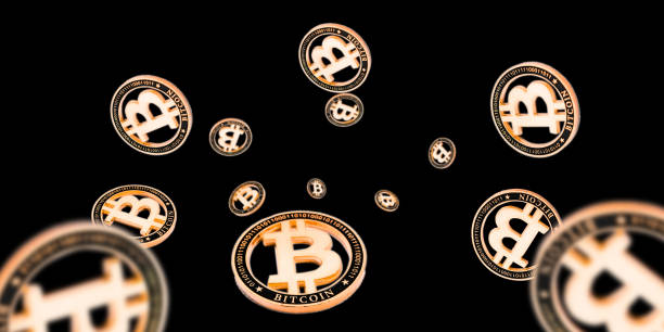 istock Litecoin. Gold Falling Bitcoins on black. Cryptocurrency golden concept. Falling background. 1194846274