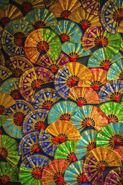 istock Traditional hand fan on display as a photography background 1194848715