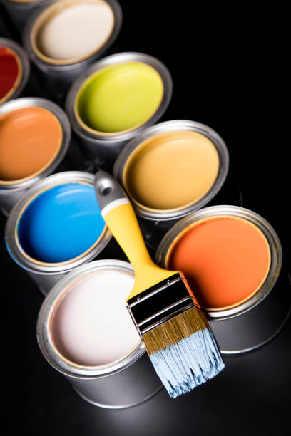 istock Open paint cans with a brush, Rainbow colors 1194849814