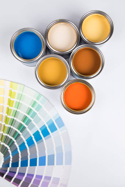 istock Full Buckets of rainbow colored oil paint 1194849879