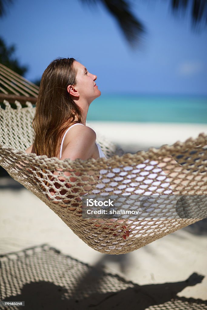 Woman relaxing in hammock  Adult Stock Photo