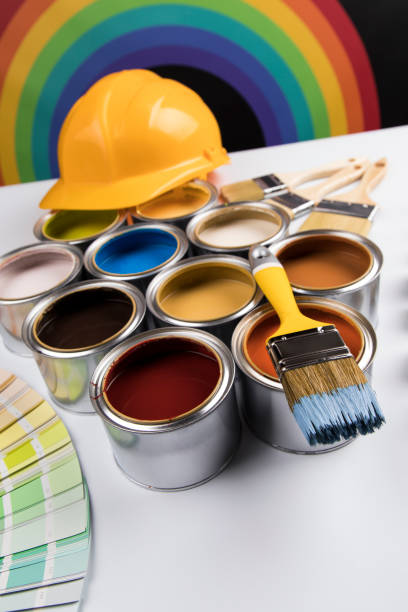 istock Rainbow colors, Open cans of paint 1194851760