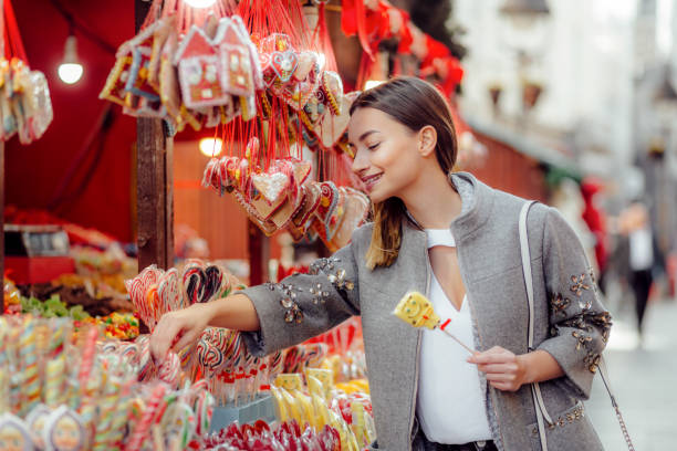 istock Young woman buying sweets and candy 1194853825
