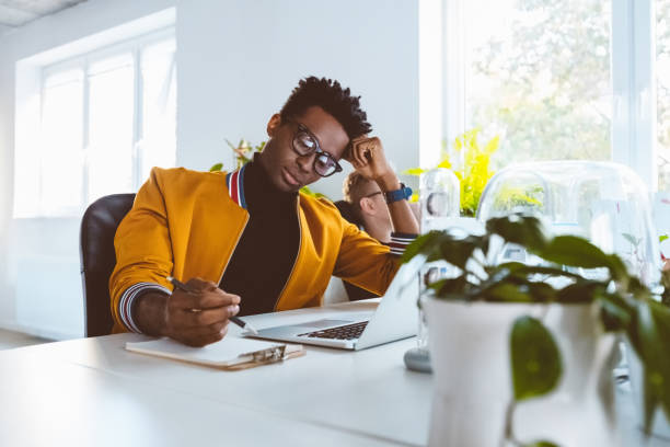 istock African businessman working at his desk 1194854901