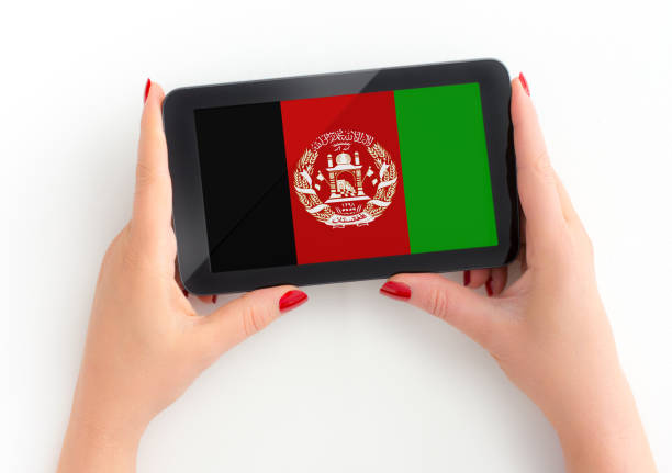 afghani flag on tablet in female hands Flag from https://www.countryflags.com/en/ free for commercial use see release