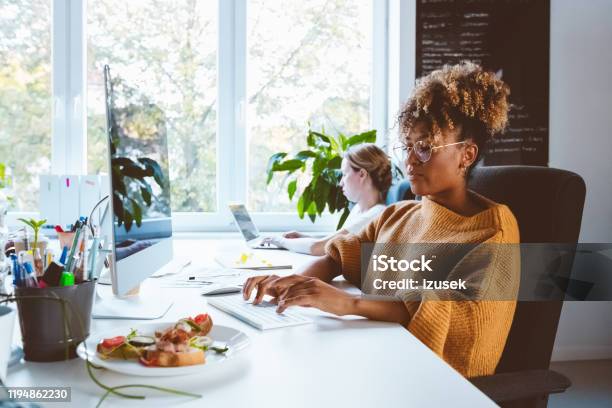 Business Professionals Working In Office Stock Photo - Download Image Now - 30-34 Years, Adult, Adults Only