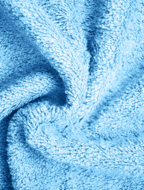 istock Bath fluffy towel toned classic blue color 1194862502